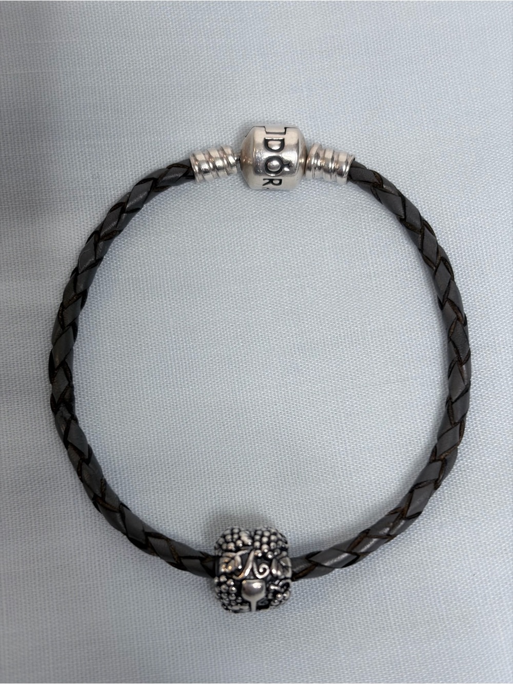 Pandora Gray Braided Leather Bracelet with wine and grapes charm.